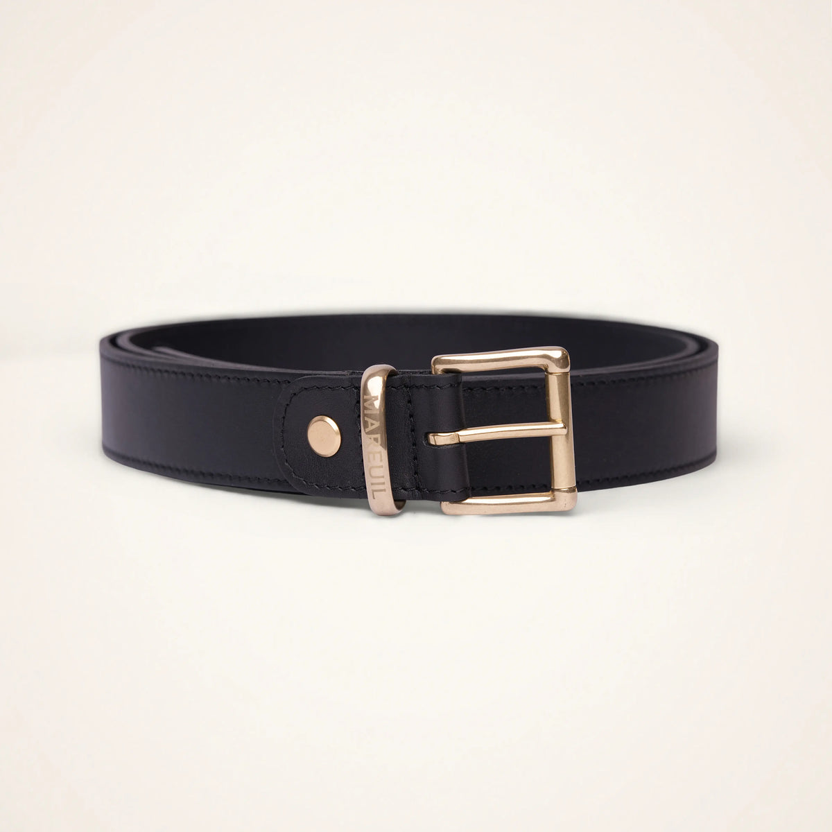 Adjustable leather belt with brass buckle