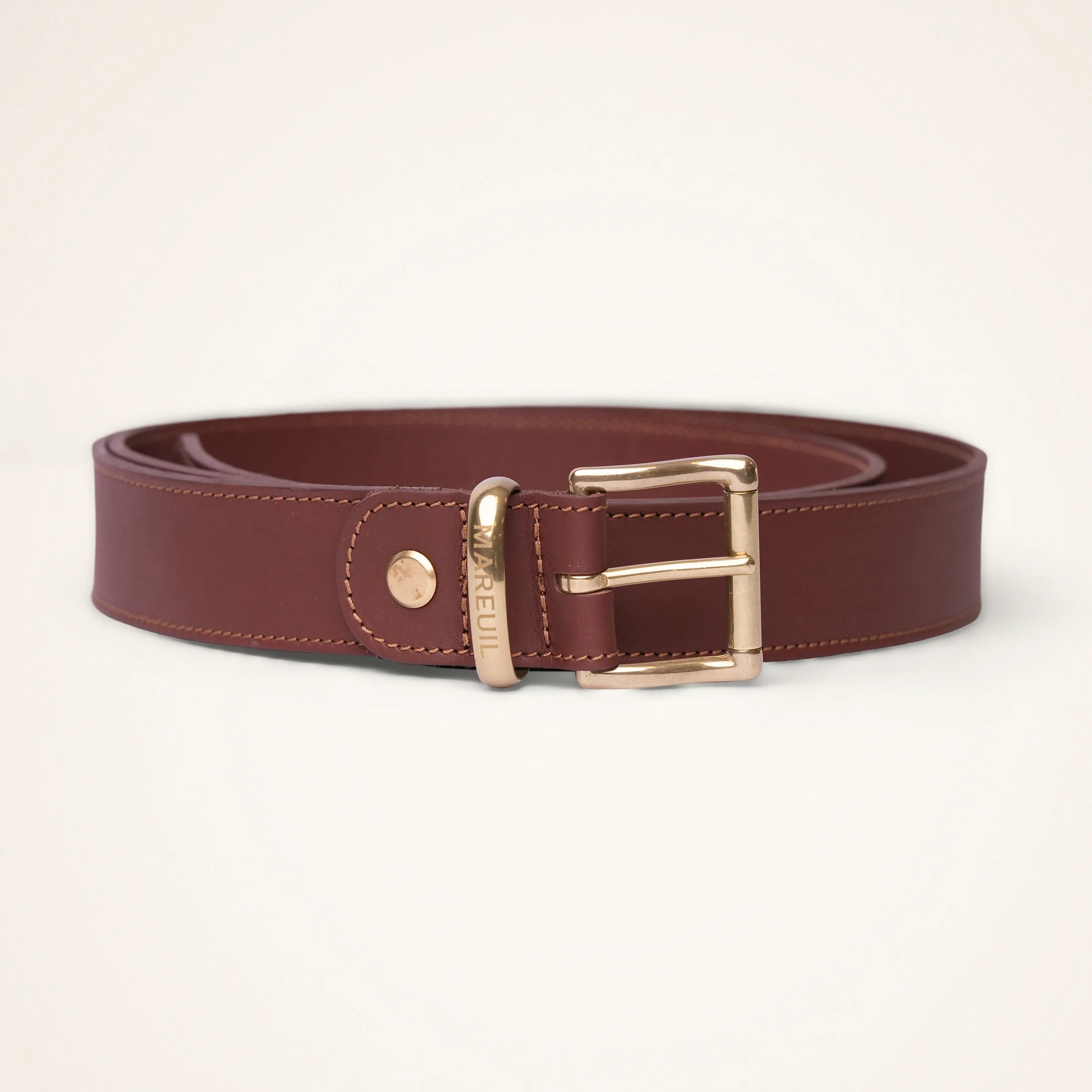 Adjustable leather belt with brass buckle