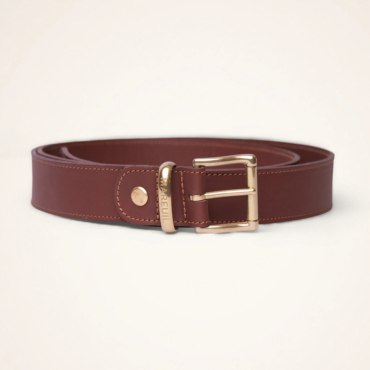 Adjustable leather belt with brass buckle