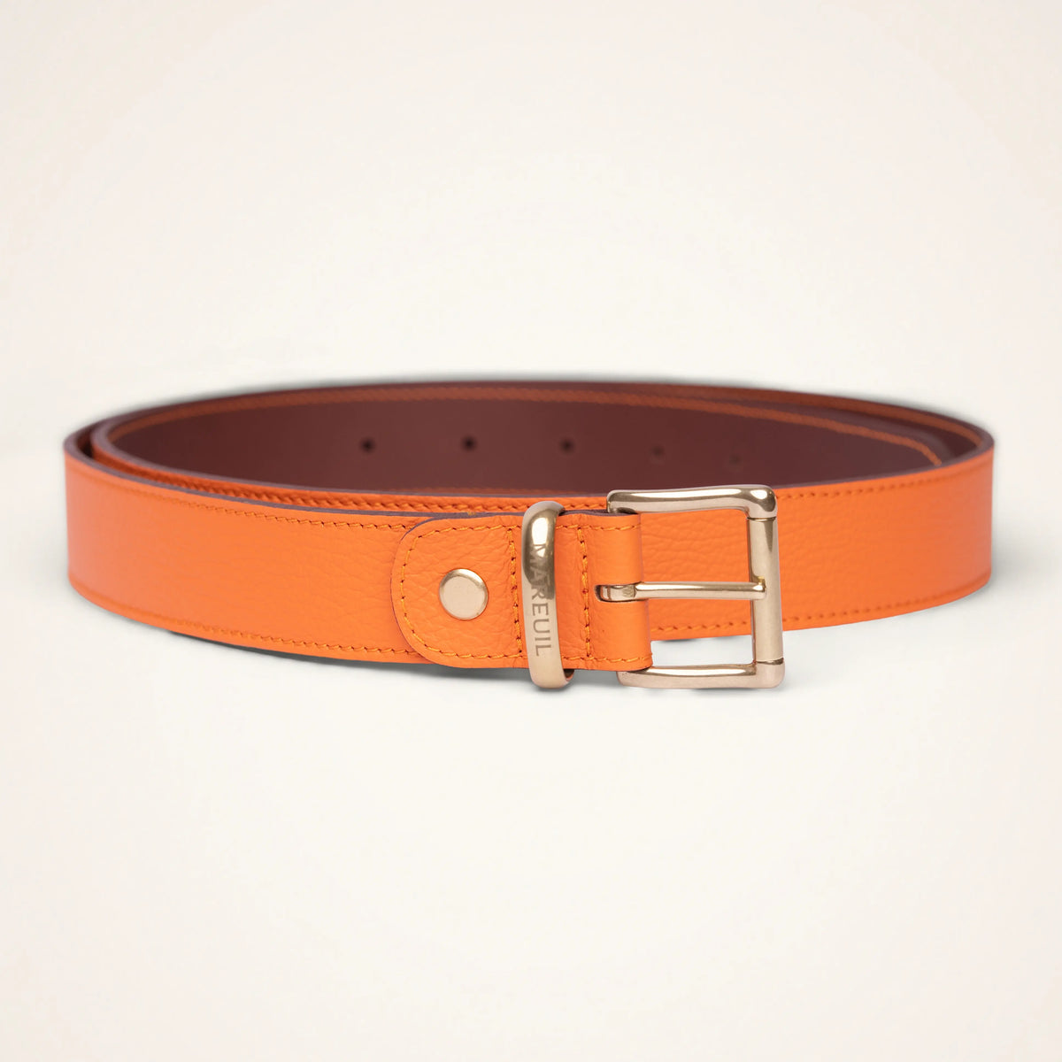 Adjustable leather belt with brass buckle
